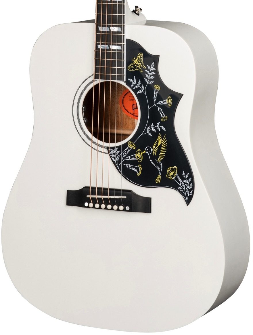 white gibson acoustic guitar